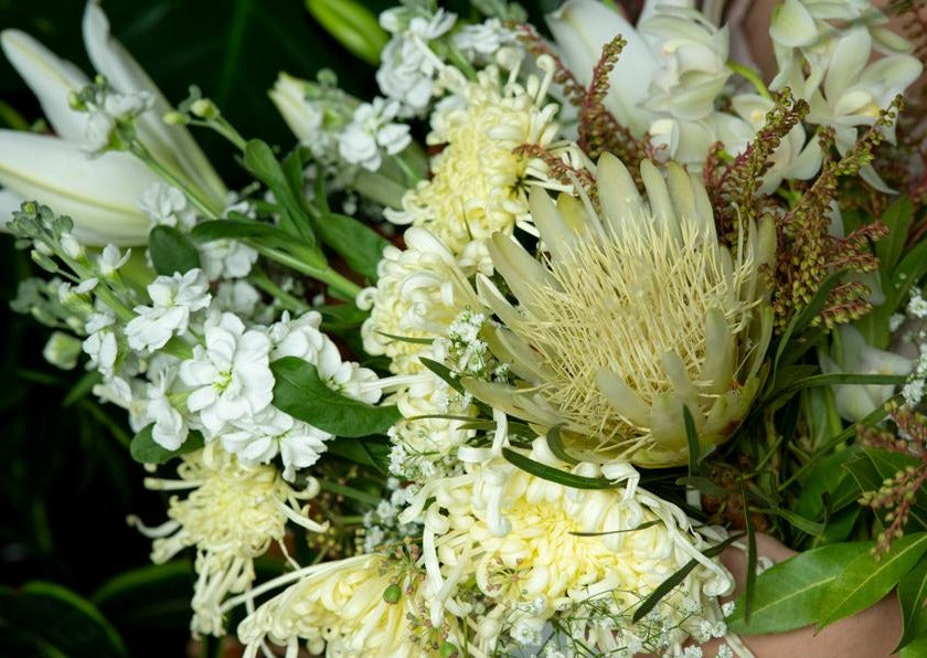 Model with Yellow "Unconditional Love" bouquet - Close up