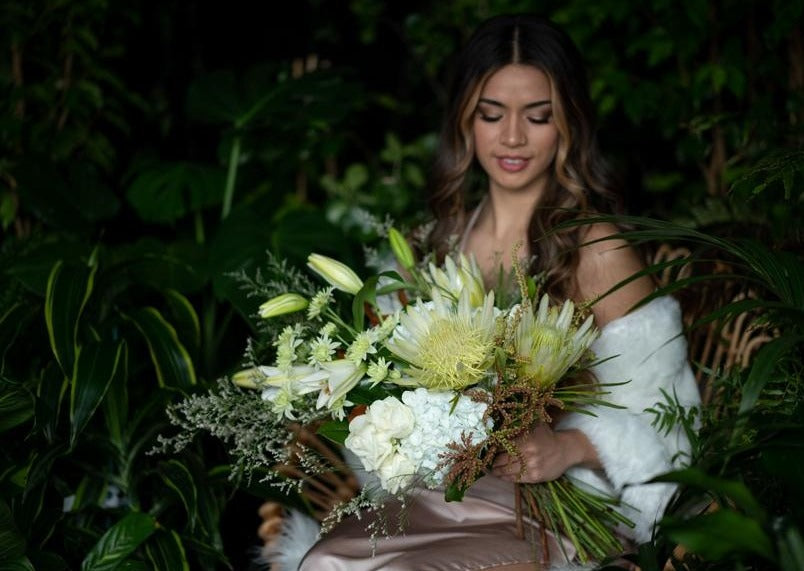 Model with Classic White "Unconditional Love" bouquet