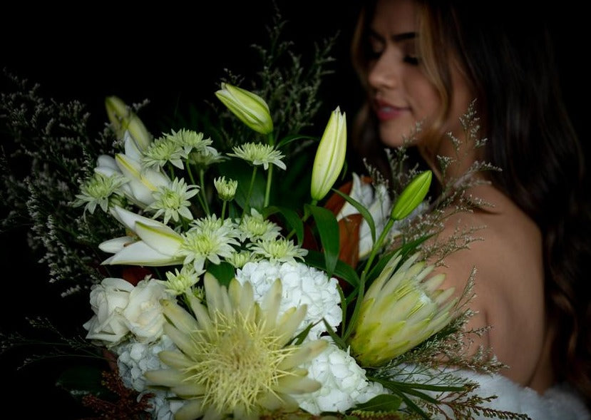 Model with Classic White "Unconditional Love" bouquet - Close up of model