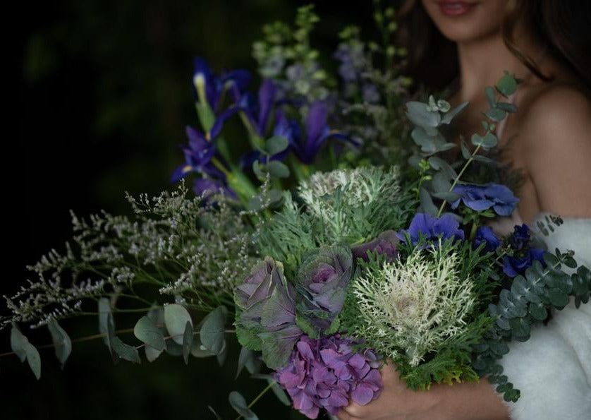 Model with Blue "Unconditional Love" bouquet - Close up of bouquet