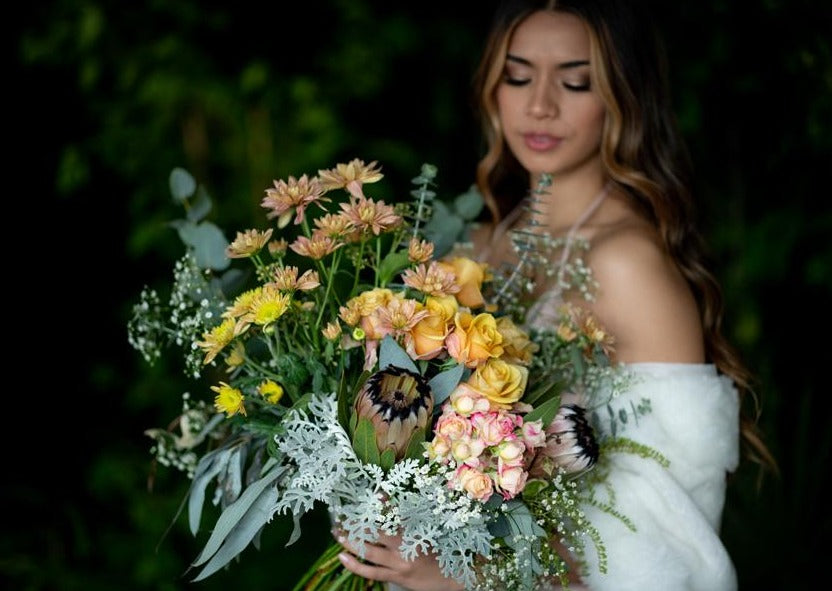 Model with Honey Orange "Unconditional Love" bouquet