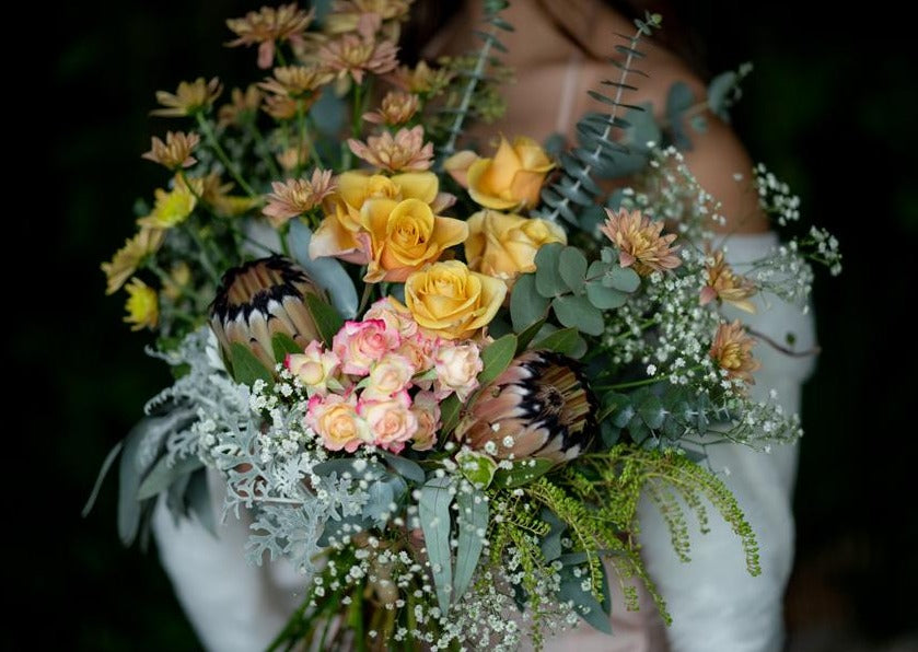 Model with Honey Orange "Unconditional Love" bouquet - Close up of bouquet