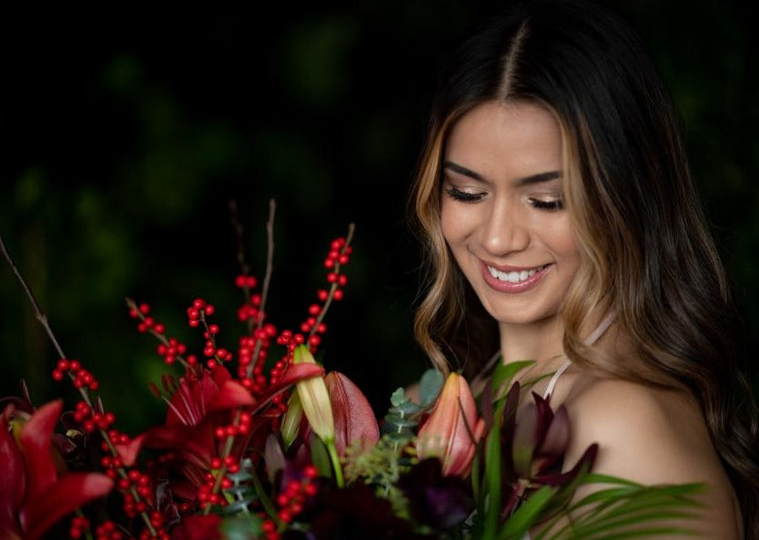 Model with Red "Unconditional Love" bouquet - Close up of bouquet and model