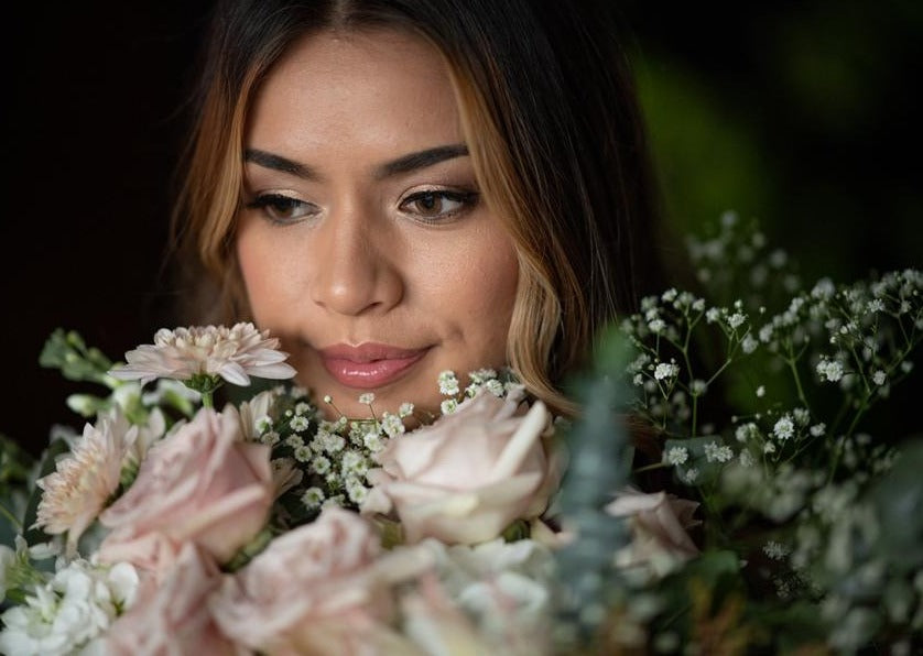 Model with Blush Pink "Unconditional Love" bouquet - Close up of model