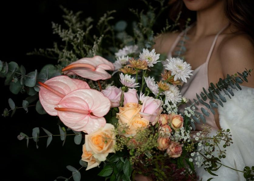 Model with Pastels "Unconditional Love" bouquet - Close up of bouquet