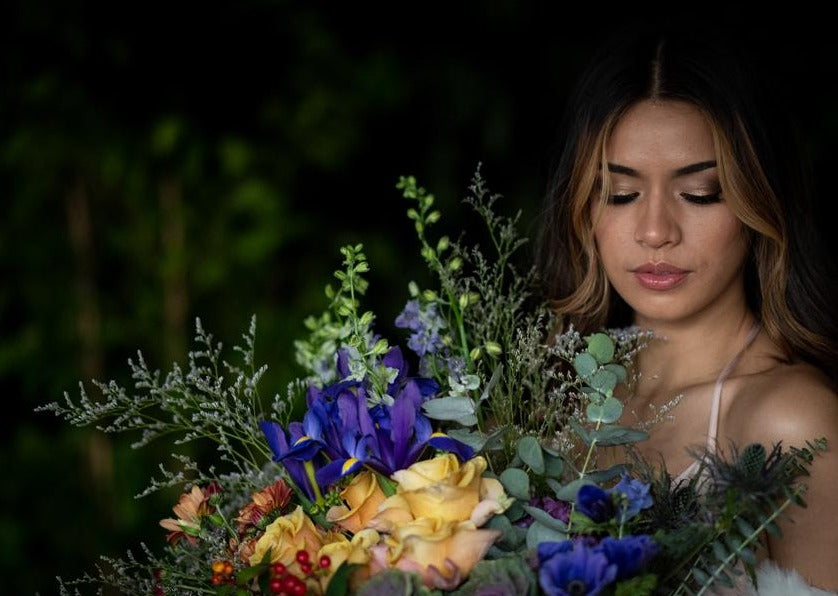 Model with Brights "Unconditional Love" bouquet - Close up of model