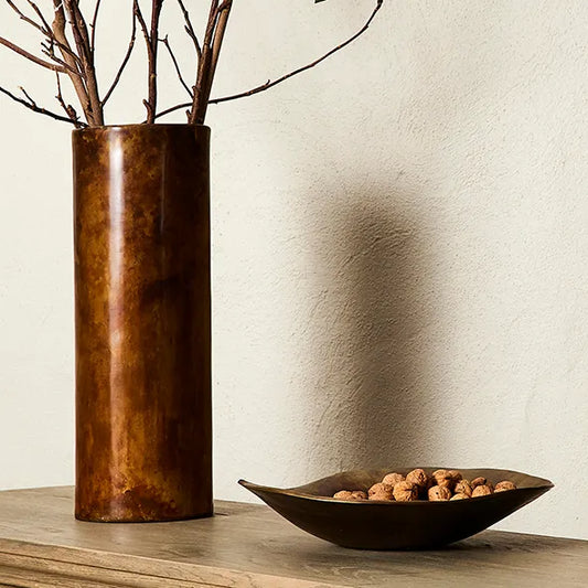 Alman Vase.  Sleek and modern column vase in murky copper finish. Use to display large branches, or long stem flowers.
