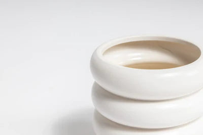 Curved cylinder shape pot is watertight and fully glazed with a matte finish. Dimensions: Medium - 16.3cm dia. x 16cm h Internal dia - 12cm
