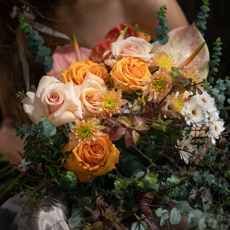 Model with Honey Orange "Unconditional Love" bouquet
