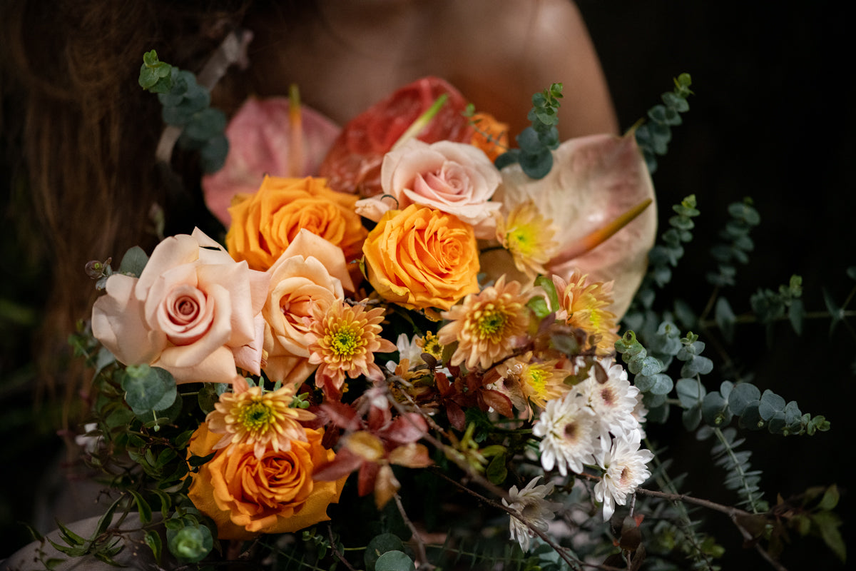 Model with Honey Orange "Unconditional Love" bouquet