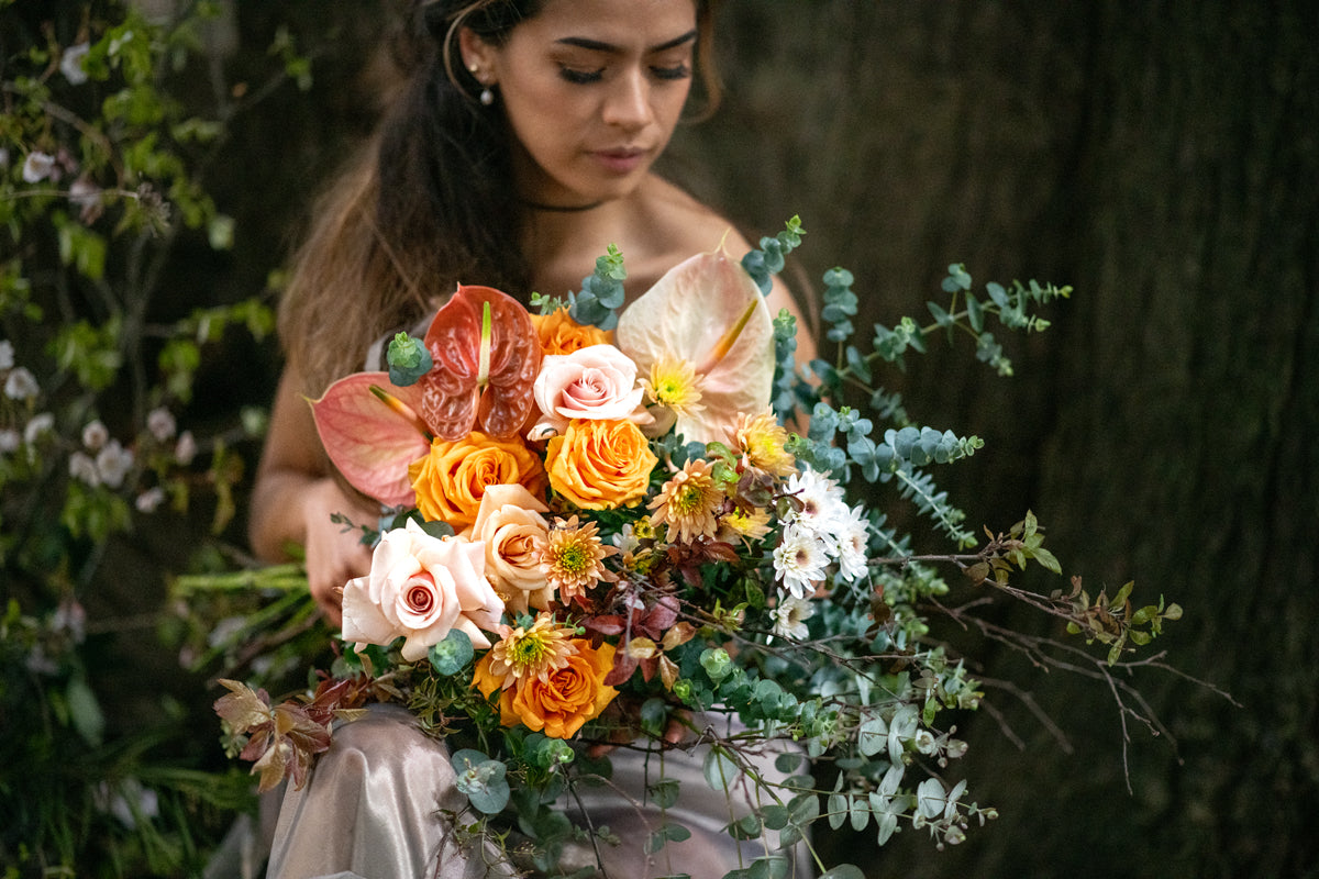Model with Honey Orange "Unconditional Love" bouquet