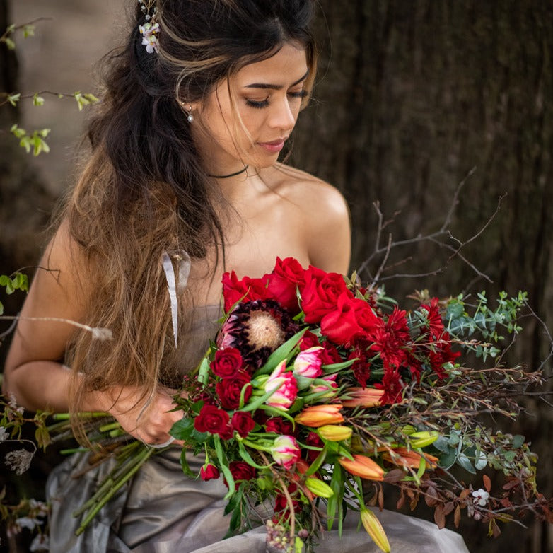 Unconditional Love bouquet pictured in Red tones.