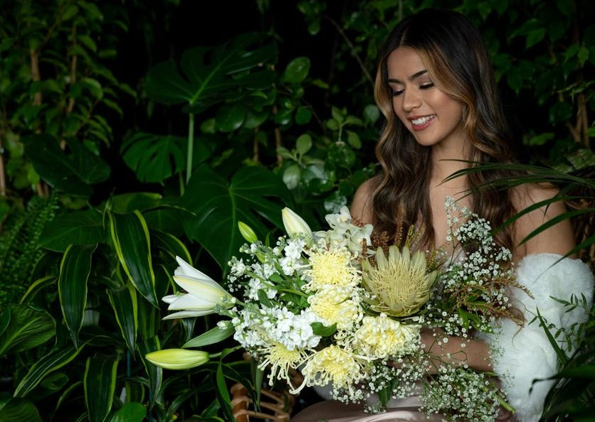 Model with Yellow "Unconditional Love" bouquet