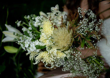 Model with Yellow "Unconditional Love" bouquet - Close up of bouquet