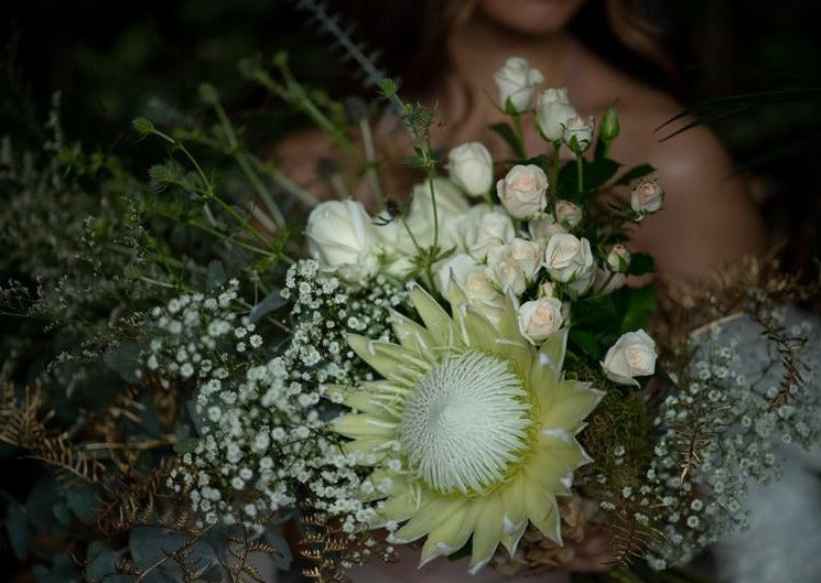 Model with Vintage White "Unconditional Love" bouquet - Close up of bouquet