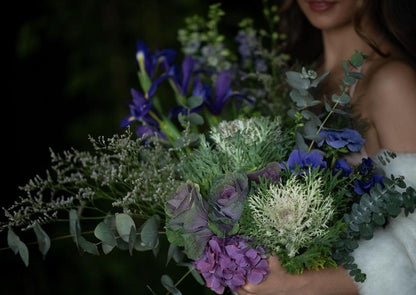 Model with Blue "Unconditional Love" bouquet - Close up of bouquet