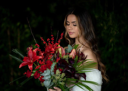 Model with Red "Unconditional Love" bouquet